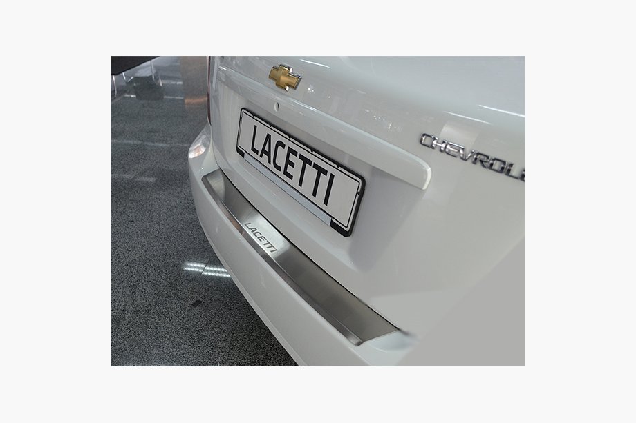 Chevrolet Lacetti 2003-2024 гг. Накладка на задний бампер с загибом Natanika (нержавейка) Image