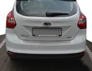 Ford Focus III 2011-2017 гг. Накладка на задний бампер с загибом Natanika (нержавейка) фото 1