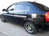 Hyundai Accent 2006-2010 гг. Накладка на лючок бензобака OmsaLine нержавейка фото 1