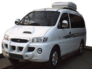 Hyundai H200, H1, Starex 1998-2007 гг. Центральная передняя губа с противотуманками (грунт под покраску) фото 1