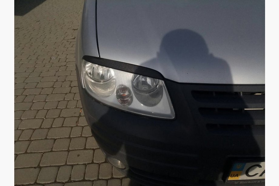 Volkswagen Caddy 2004-2010 гг. Реснички на фары (черные) Фото 8