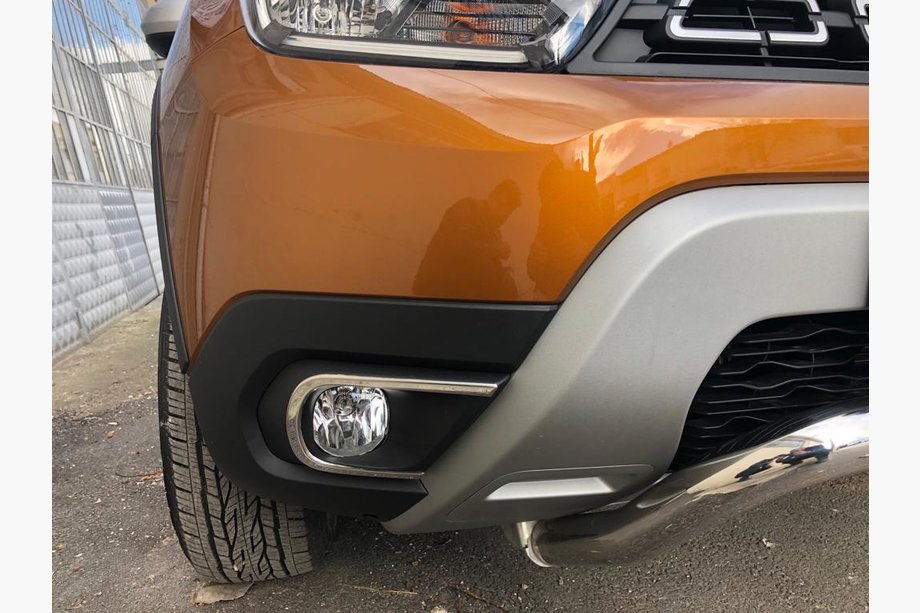 Dacia Duster 2018-2024 гг. Накладки на противотуманные фары (2 шт., нержавейка) Image