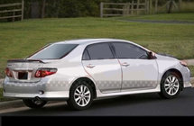Toyota Corolla 2007-2013 гг. Накладка на задний бампер (грунтованная под покраску) фото 4