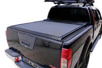 Nissan Navara 2006-2015 гг. Рулонная крышка Omback фото 1
