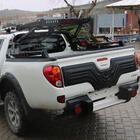 Mitsubishi L200 2006-2015 гг. Пластиковая накладка на крышку багажника фото 1