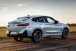 Обзор BMW X4: обновленный купеобразный кроссовер фото 3