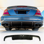 Mercedes E-class W211 2002-2009 гг. Диффузор заднего бампера для E55 AMG 2003-2006, Карбон фото 2