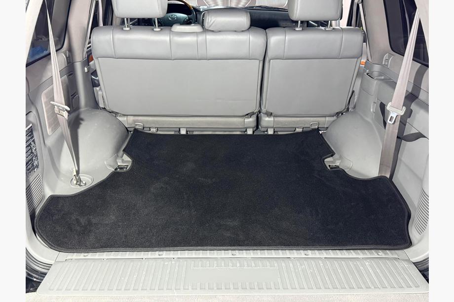 Toyota Land Cruiser 100 1998-2007 гг. Текстильный коврик багажника Premium 2 шт Черный (7 мест) Image