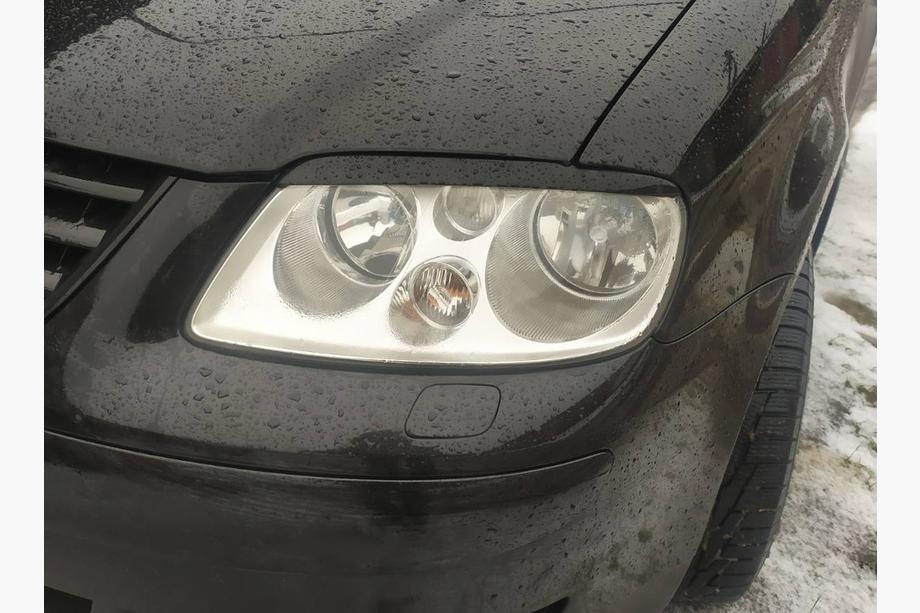 Volkswagen Caddy 2004-2010 гг. Реснички на фары (черные) Image