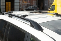 Kia Carnival 2021- гг. Багажник (поперечины) на стандартные рейлинги с замком WingBar V1 (2 шт) до 110 см, Серые фото 3