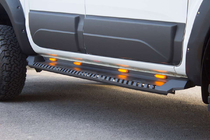 Volkswagen Amarok 2022- гг. Боковые пороги Dakar V1 с LED (2 шт, металл) фото 1
