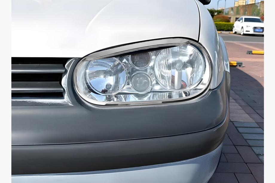 Volkswagen Golf 4 1997-2006 гг. Накладки на фары Очки V3 (2 шт., пластик) Image