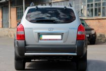 Hyundai Tucson JM 2004- гг. Задняя дуга AK002 (нерж. сталь) фото 1