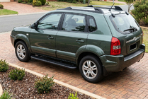 Hyundai Tucson JM 2004- гг. Боковые пороги Bosphorus Black (2 шт., алюминий) фото 1