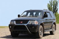 Mitsubishi Pajero Sport 1996-2007 гг. Кенгурятник WT003 Черный Нержавейка фото 3