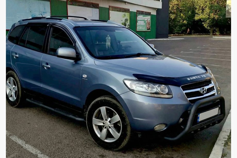 Hyundai Santa Fe 2 2006-2012 гг. Кенгурятник WT004 Черный (Нержавейка) Image