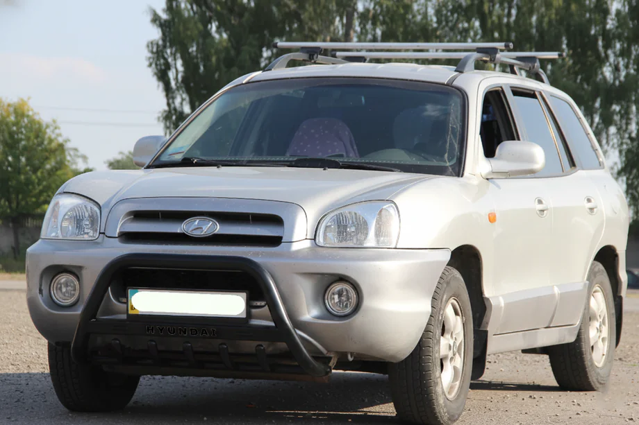 Hyundai Santa Fe 1 2000-2006 гг. Кенгурятник WT004 Черный (Нержавейка) Image