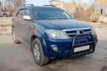Toyota Fortuner 2006-2015 гг. Кенгурятник F12-11 Black (нерж) фото 2