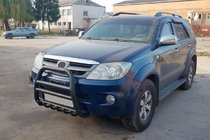 Toyota Fortuner 2006-2015 гг. Кенгурятник F12-11 Black (нерж) фото 1