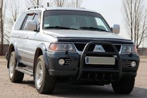 Mitsubishi Pajero Sport 1996-2007 гг. Кенгурятник QT007 Black (нерж) фото 2