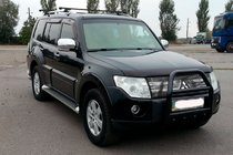 Mitsubishi Pajero Wagon IV 2006-2021 гг. Кенгурятник QT007 Black (нерж.) фото 1