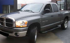 Dodge RAM (DR/DH/D1/DC/DM) 2002–2009 гг. Боковые угловые трубы Black (2 шт., нержавейка) фото 1