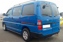 Toyota HiAce Боковые трубы Black (2 шт., нержавейка) фото 1