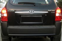Hyundai Tucson JM 2004- гг. Задняя дуга AK002 Черная (нерж.) фото 1