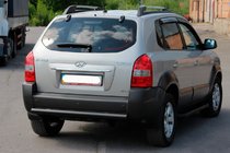 Hyundai Tucson JM 2004- гг. Задняя дуга AK002 Черная (нерж.) фото 2