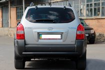 Hyundai Tucson JM 2004- гг. Задняя дуга AK002 Черная (нерж.) фото 3