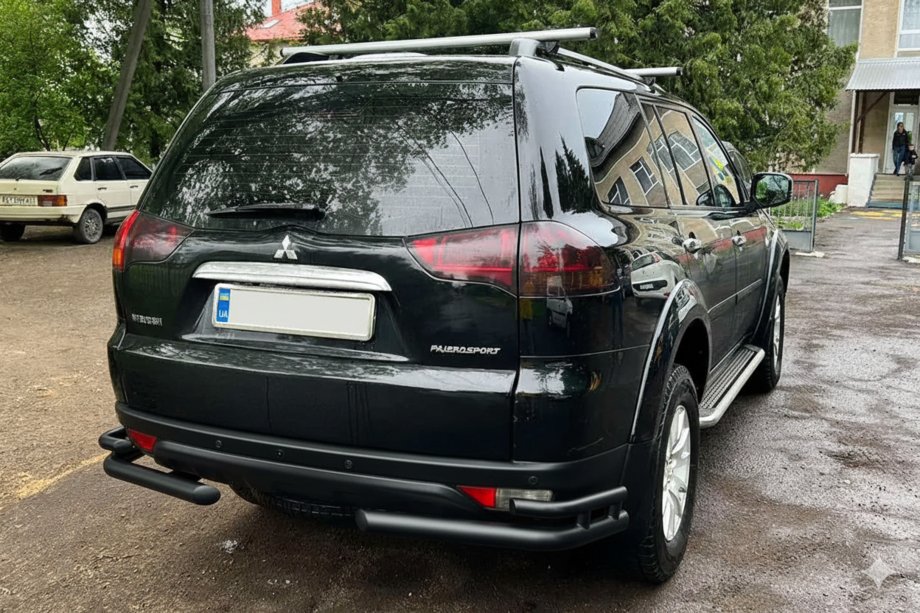 Mitsubishi Pajero Sport 2008-2015 гг. Задняя защита AK003-Double Black (2 шт., нержавейка) Image