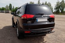 Mitsubishi Pajero Sport 2008-2015 гг. Задняя защита AK002-2 Черный (2 шт, нерж. сталь) фото 3