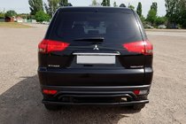 Mitsubishi Pajero Sport 2008-2015 гг. Задняя защита AK002-2 Черный (2 шт, нерж. сталь) фото 4