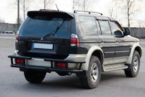 Mitsubishi Pajero Sport 1996-2007 гг. Задняя защита AK-Special Black (нержавейка) фото 3