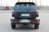 Mitsubishi Pajero Sport 1996-2007 гг. Задняя защита AK-Special Black (нержавейка) фото 4