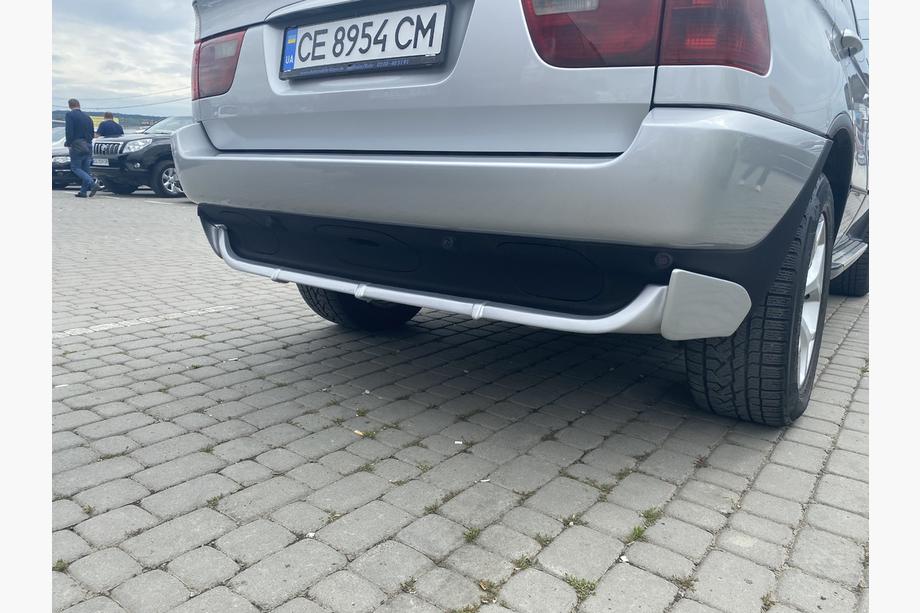 BMW X5 E53 1999–2006 гг. Накладка на задний бампер (грунтованная под покраску) Image