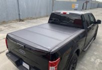 Toyota Hilux 2015- гг. Крышка в кузов 4-секционная фото 1