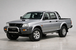 Обзор Mitsubishi L200 1996–2006: олдскульный пикап без глянца фото 1