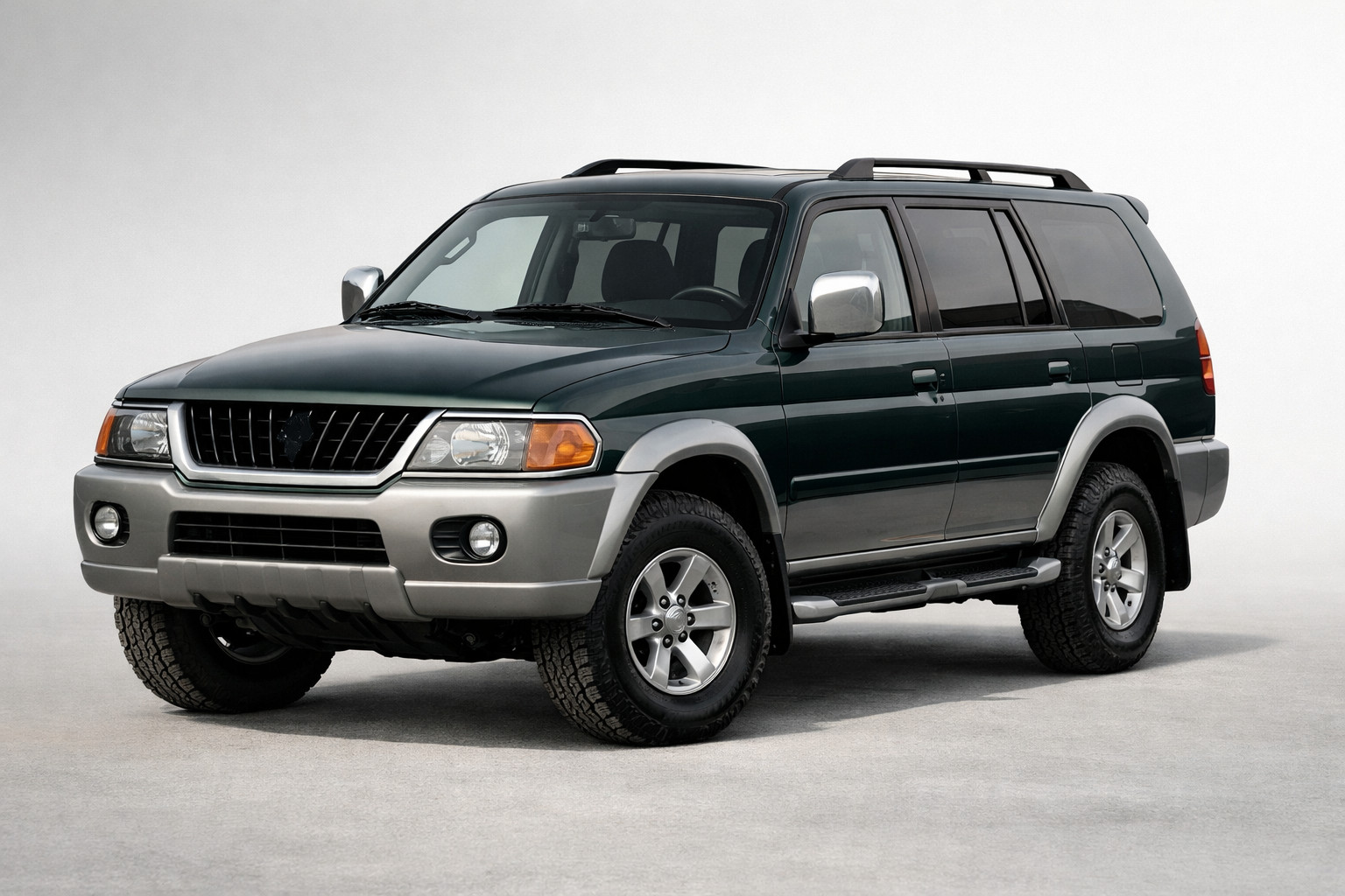 Обзор Mitsubishi Pajero Sport 1996-2007: старый рамник без прикрас