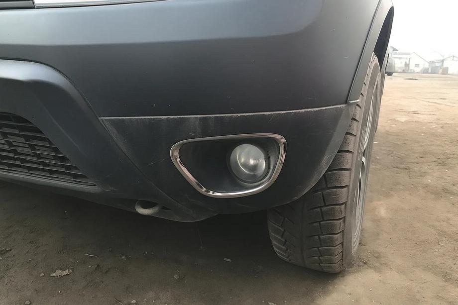 Dacia Duster 2008-2018 гг. Накладки на противотуманные фары 2010-2013 (2 шт., нержавейка) Image