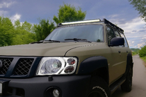 Nissan Patrol Y61 1997-2011 гг. Накладки на Фары (2001-2004, 2 шт.) фото 1