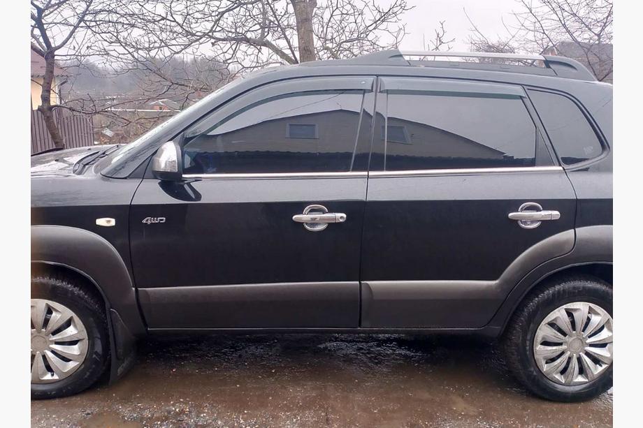 Hyundai Tucson JM 2004- гг. Окантовка стекол Нержавеющая сталь (4 шт) Image