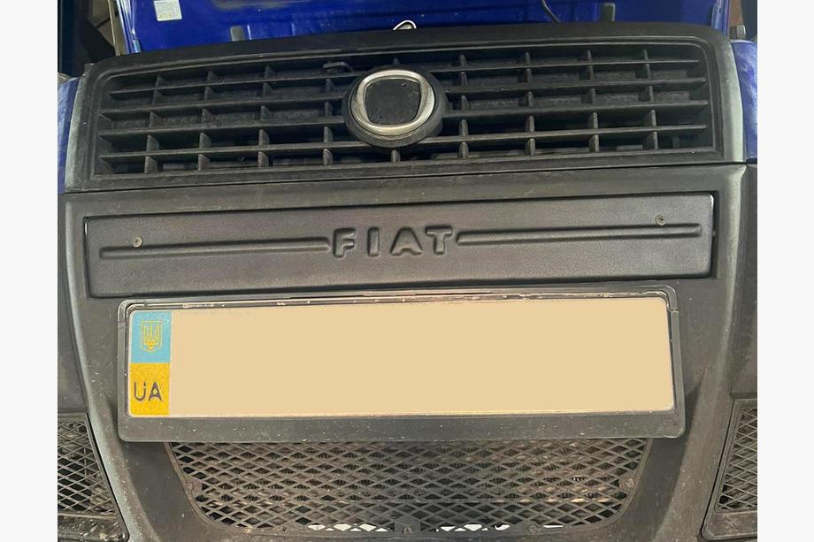 Fiat Doblo I 2005-2010 гг. Средняя зимняя накладка на решетку Image