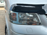 Volkswagen T5 Transporter 2003-2010 гг. Хромированные накладки на передние фары (2 шт., нержавейка) фото 5