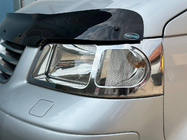 Volkswagen T5 Transporter 2003-2010 гг. Хромированные накладки на передние фары (2 шт., нержавейка) фото 4