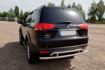 Mitsubishi Pajero Sport 2008-2015 гг. Задняя защита AK002-2 (2 шт, нерж сталь) фото 1