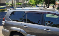 Toyota Land Cruiser Prado 120 2002-2009 гг. Рейлинги Хром турецкие Пластиковые ножки фото 2