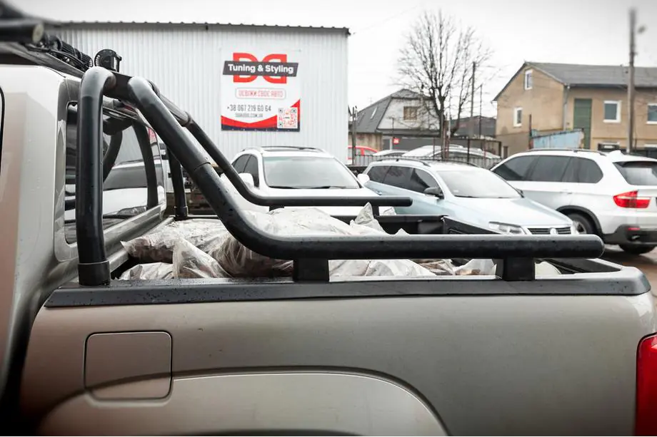 Volkswagen Amarok 2010-2022 гг. Дуга на кузов (черная) Image