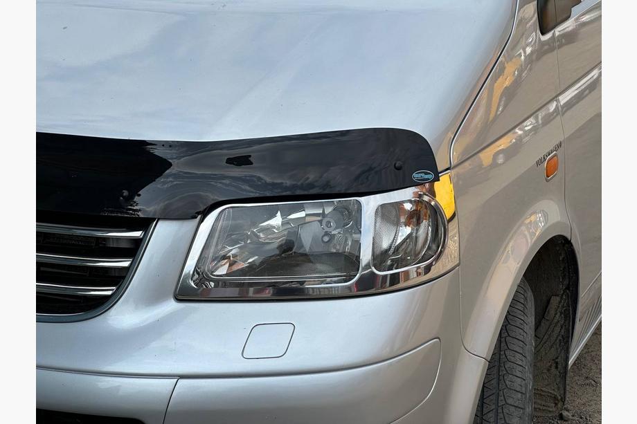 Volkswagen T5 Multivan 2003–2010 гг. Хромированные накладки на передние фары (2 шт., нержавейка) Фото 3