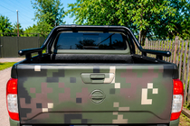 Nissan Navara 2006-2015 гг. Дуга на кузов (черная) фото 3